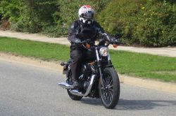 David Hooper getting himself noticed riding the Harley-Davidson 883 Iron.